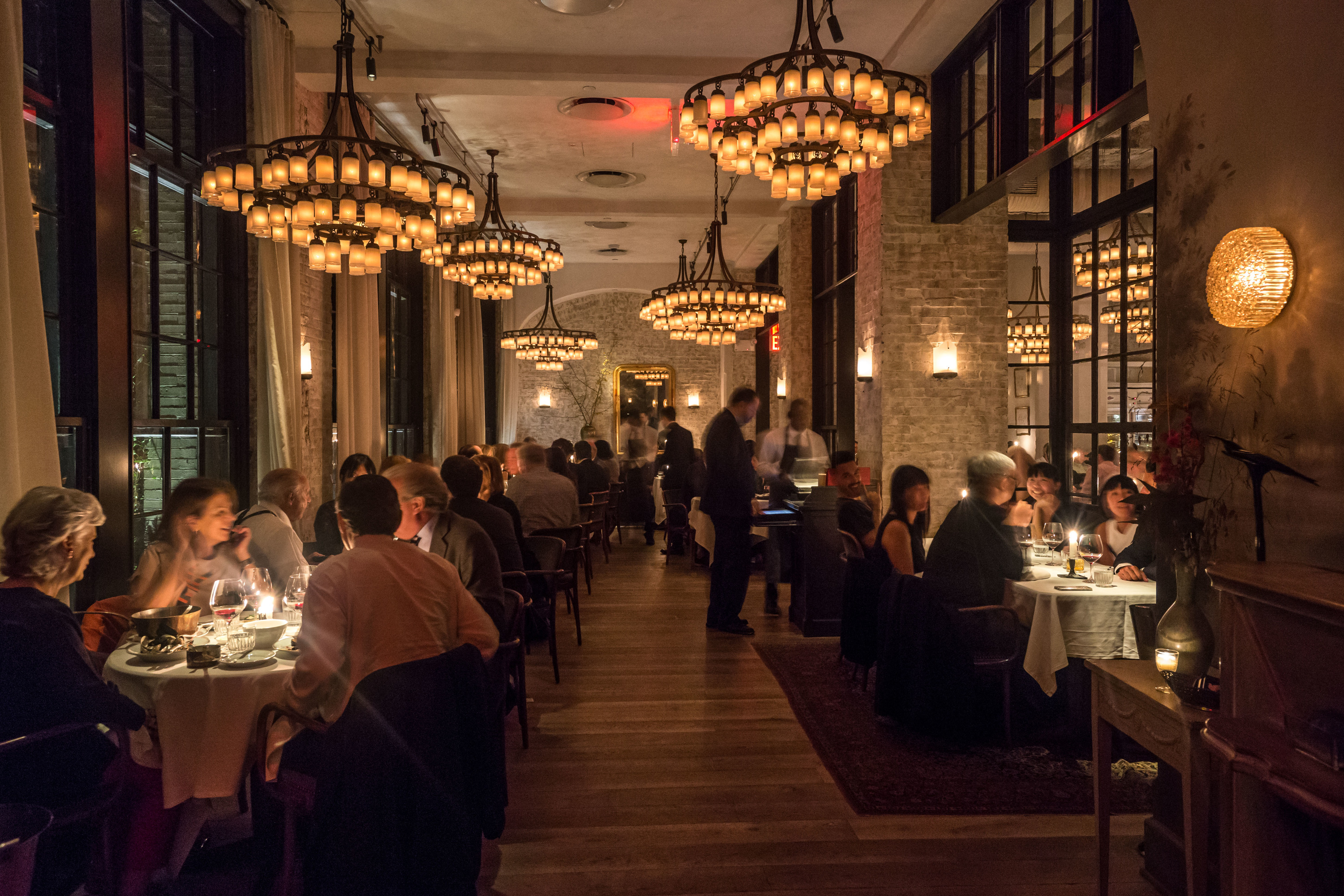 The Psychology of Restaurant Interior Design, Part 3: Lighting | Fohlio | Le Coucou | restaurant lighting | intimate lighting | material library | FF&E | FFE | interior design software | digital materials library