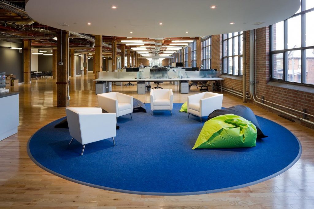 Workspace-Design-How-to-Build-Happiness-Into-the-Office-Ubisoft-shared-workspace | Fohlio | FF&E specification software
